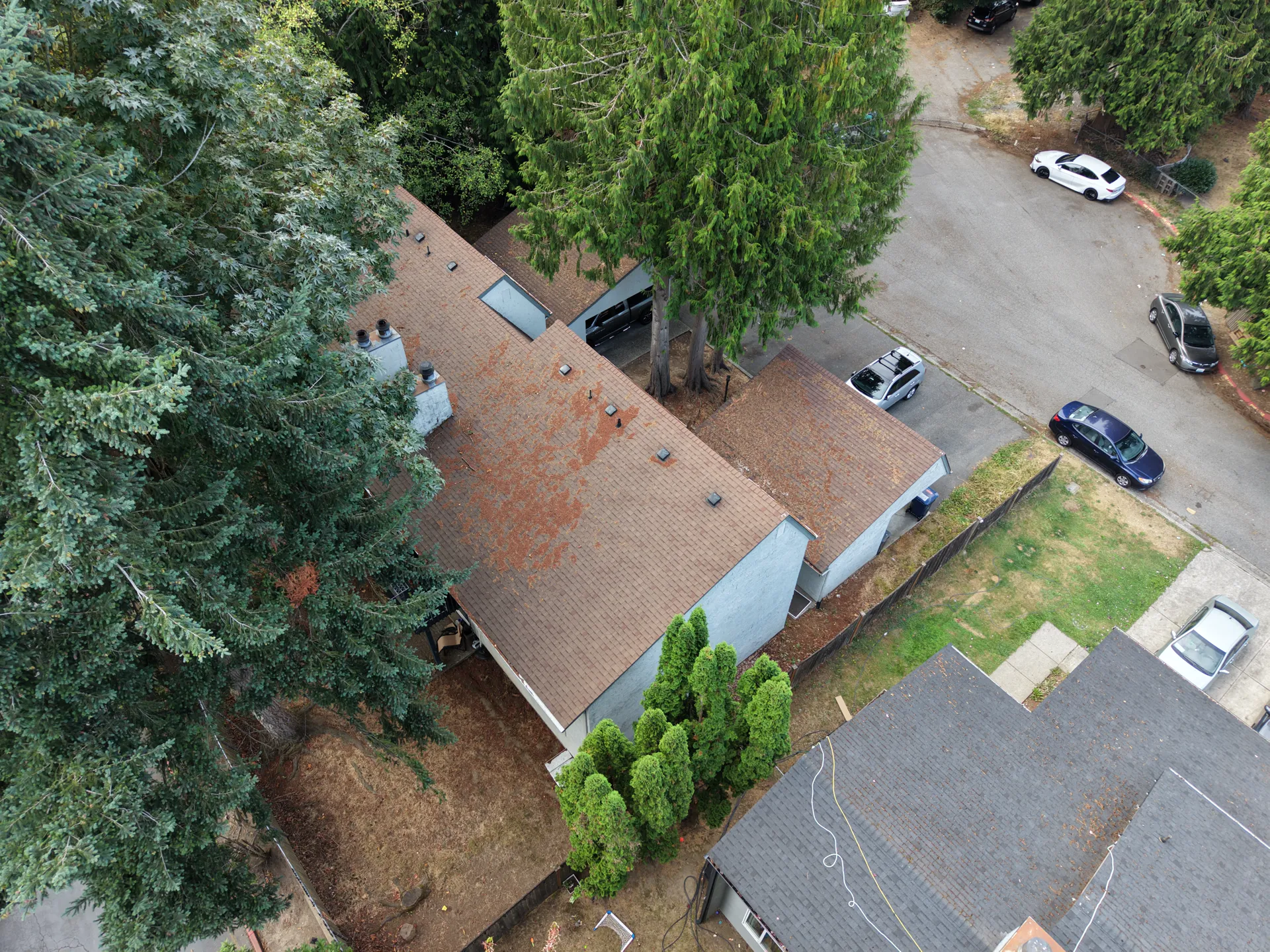 Overhead view of the roof, lot and parking